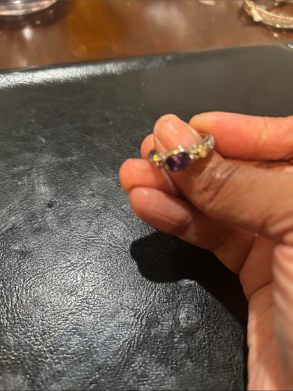 Elegant Purple Gemstone Ring with Clear Accent Stones